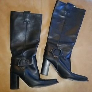 Knee high black leather boots with ankle buckle